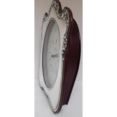 103 - R Carr silver teak mantle clock in working order