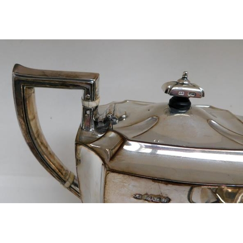 105 - Silver 3 piece tea set, Stevensons & Law of Sheffield 1917. Ivory insulators and engraving.