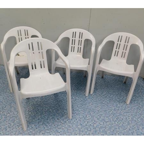 557 - Set of 4 white garden chairs