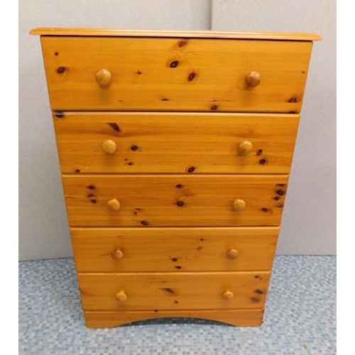 574 - Five drawer pine chest of drawers. Dimensions H 45