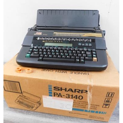 643 - Boxed Sharp PA 3140 electric typewriter