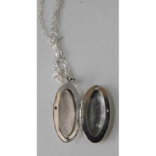 205 - Silver and jet locket on silver chain