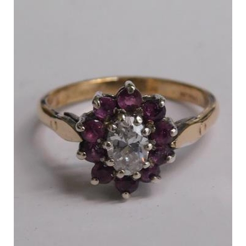 209 - 9ct Amethyst cluster ring silver mount size N