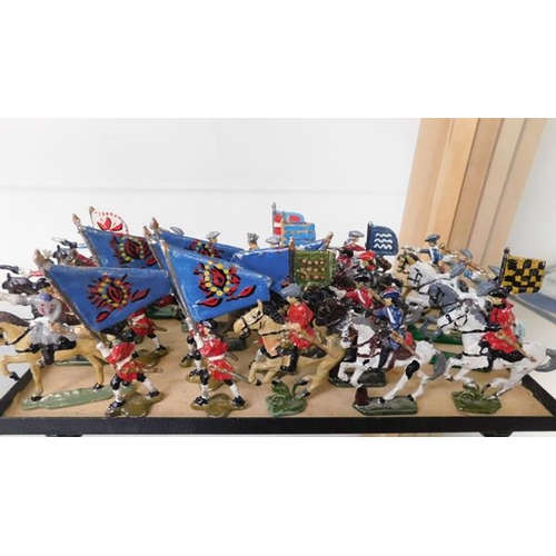 213 - Large assortment of mounted lead soldiers