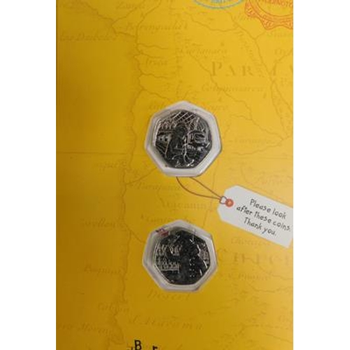 243 - 2x Paddington coin sets