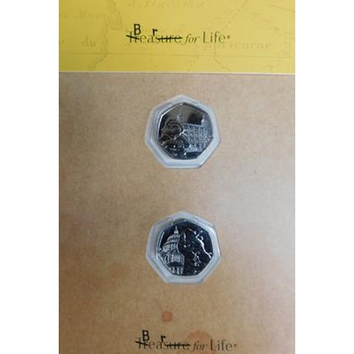 243 - 2x Paddington coin sets