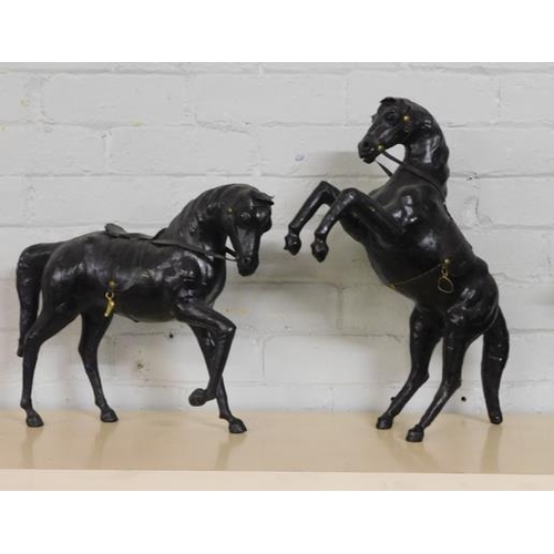 543a - Pair of leather covered horses
