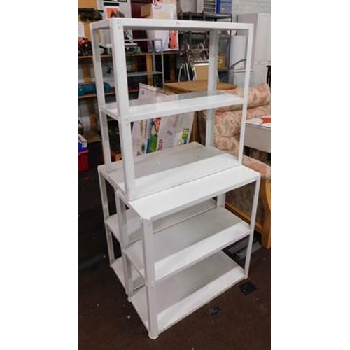 549 - Three sets of metal storage shelves