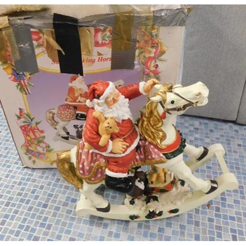 630 - Large rocking Santa on horse in box