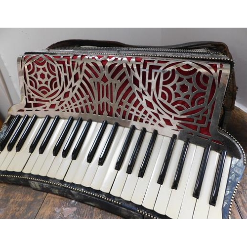1 - Piano accordion in case...