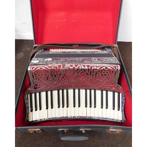 1 - Piano accordion in case...