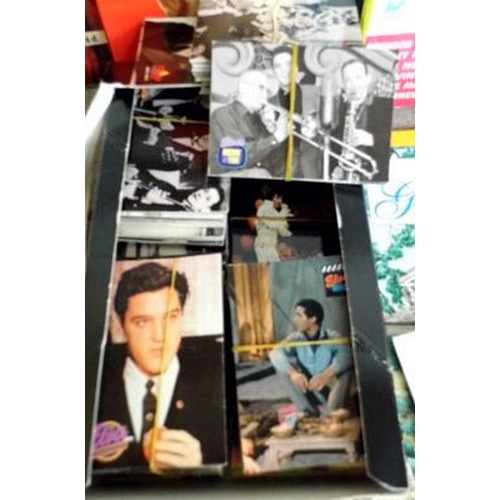 23 - Assortment of vintage Elvis books and box of loose cards of his life