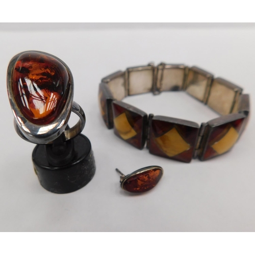 118 - Silver hallmarked amber ring and earring (1x) and unusual art deco style amber inlaid silver bracele... 