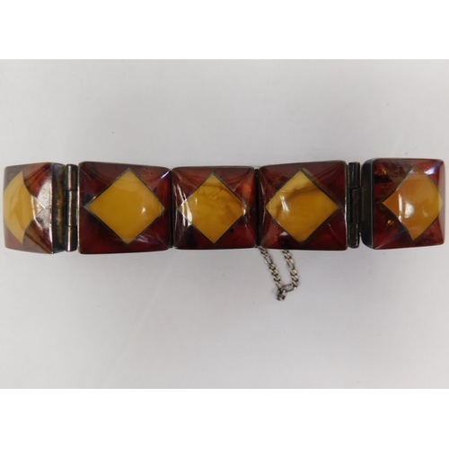 118 - Silver hallmarked amber ring and earring (1x) and unusual art deco style amber inlaid silver bracele... 