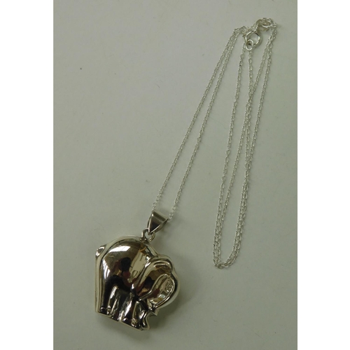 210 - Silver elephant locket on silver chain