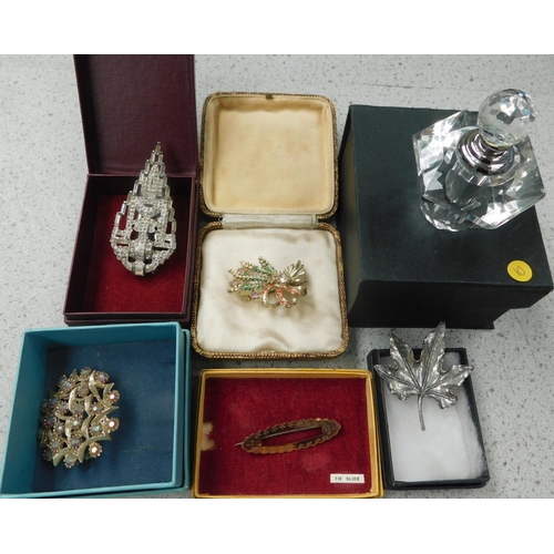 234 - Assortment of vintage brooches & Art Deco style perfume bottle