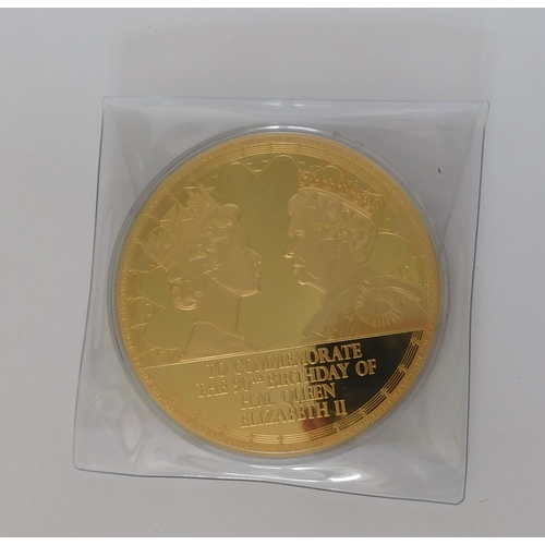 146 - Large gold plated commemorative coin - sealed with paperwork 90th birthday of Elizabeth II