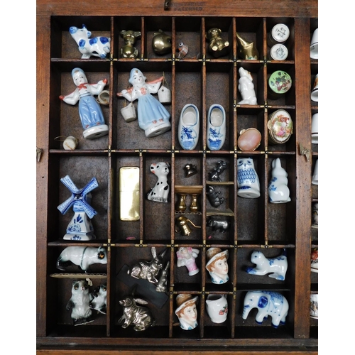 166 - Large vintage display cabinet 'patented' full of collectables Approx 14.5x32.5