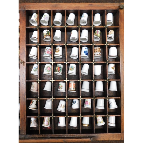 166 - Large vintage display cabinet 'patented' full of collectables Approx 14.5x32.5