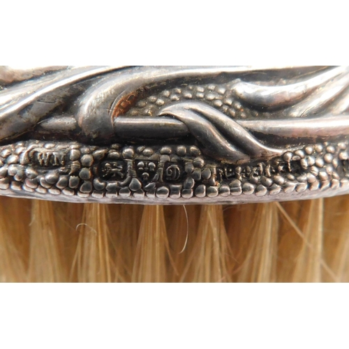 213 - Hallmarked Chester - art noveau silver brush with silver clothes brush