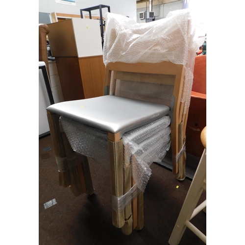 656 - 4x New & still wrapped dining/reception chairs