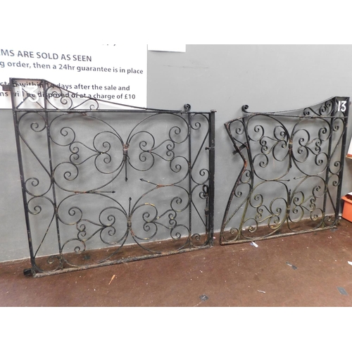 725a - Pair of heavy wrought iron gates approx 56