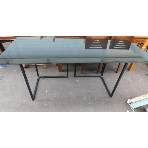 778 - Black glass topped rectangular table 31 x 71