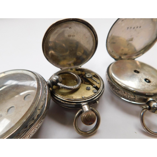 118 - A pair of antique style, vintage sterling silver ladies pocket watches + a sterling silver case