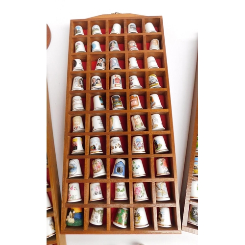 80 - Large collection of bone china thimbles with displays