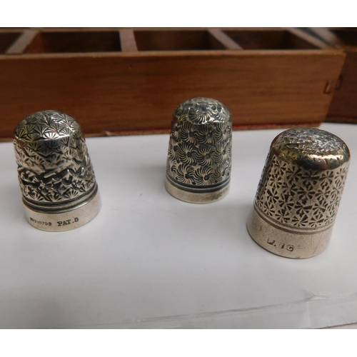 80 - Large collection of bone china thimbles with displays