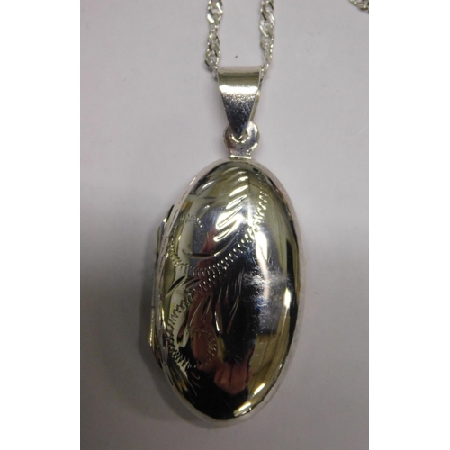 104 - Silver locket on silver chain