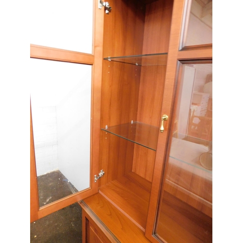 540 - Teak glass fronted display cabinet