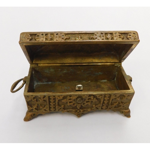 101 - Late Antique/Early Vintage, brass Oriental style jewellery casket – hand detailed on lion feet