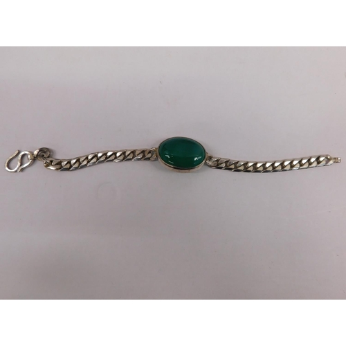 131 - Silver bracelet with green stone
