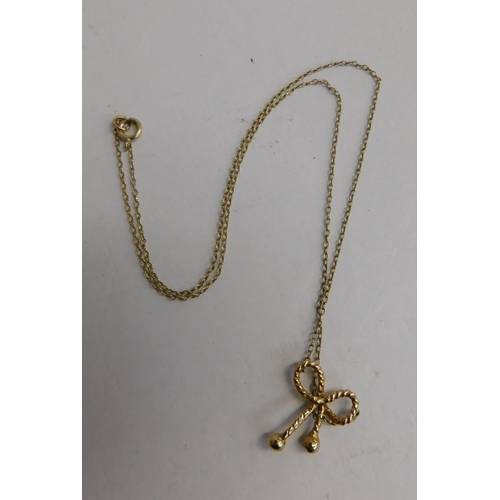 133a - 9ct Gold bow necklace