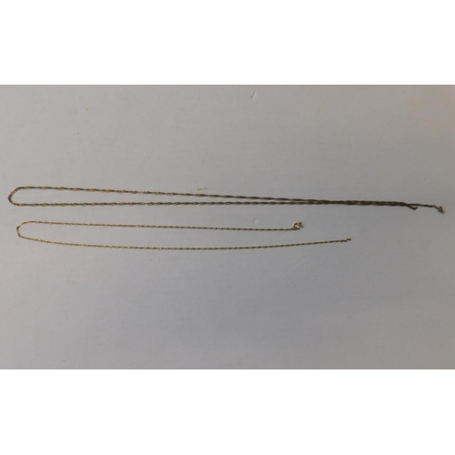 142 - 9ct Gold long chain and 9ct gold chain - both with broken clasps
