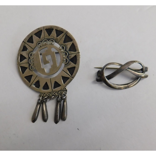 146a - 2x Silver brooches