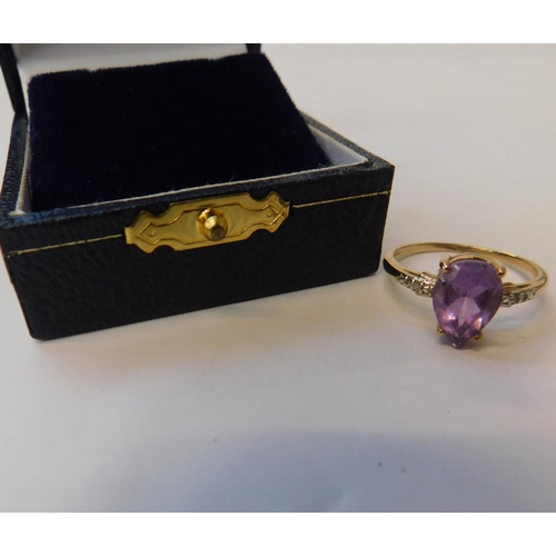 155 - 9ct gold & amethyst set ring