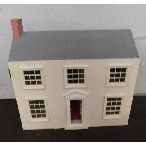 569 - Dolls house and furniture