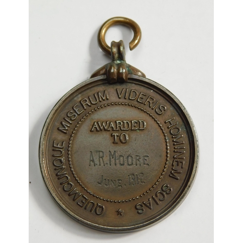 119 - Royal life saving medal to A.R. Moore, 1912