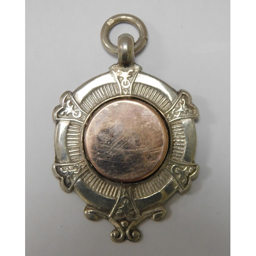 121 - Antique silver and gold fob c.1913