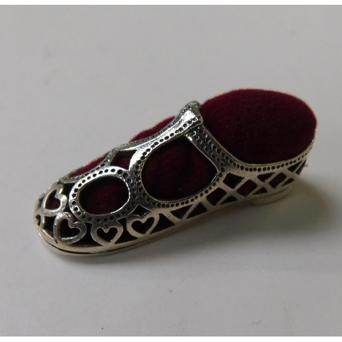 125 - Silver shoe pin cushion
