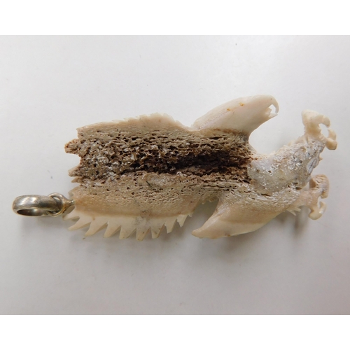 129 - Finely carved antler horn eagle pendant