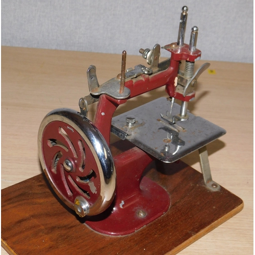 648 - Vintage miniature sewing machine