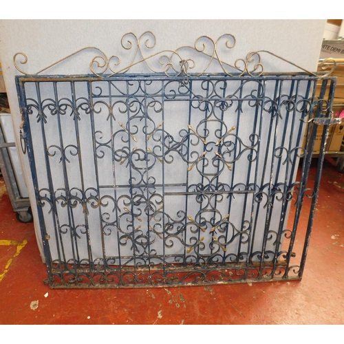 768 - Pair of wrought iron heavy decorative drive gates - approx. 56