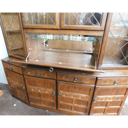 643 - Larkwood large display cabinet in oak with cocktail section