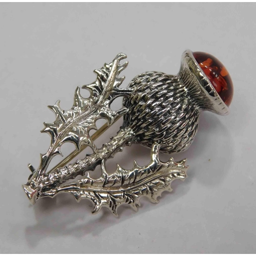 106 - Silver & amber - thistle brooch