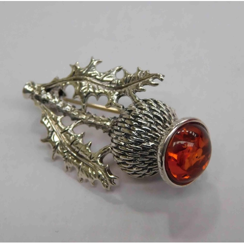 106 - Silver & amber - thistle brooch