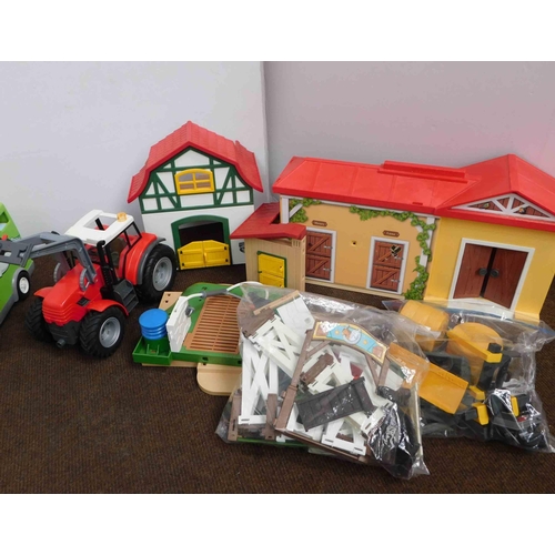 43 - Playmobil stables including - show jumping, horseboxes, 14 horses, 21 figures, vehicles, fences & ac... 