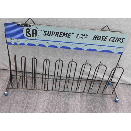 521 - Vintage 'Supreme' garage hose clips stand